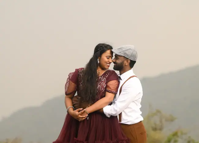 Pre-wedding couple portrait in soft hill light