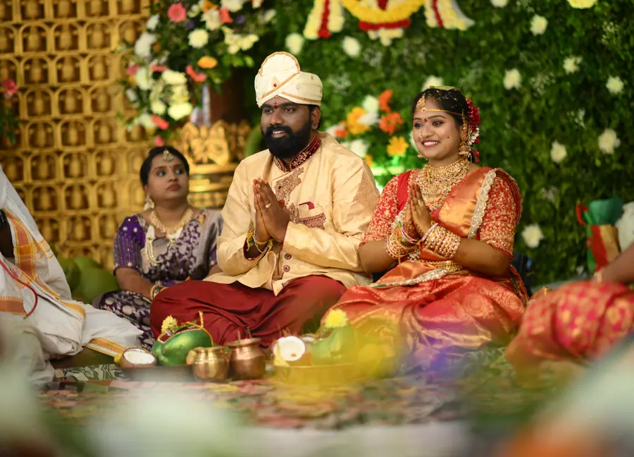 Wedding ceremony scene captured with flowers, rituals, and family presence