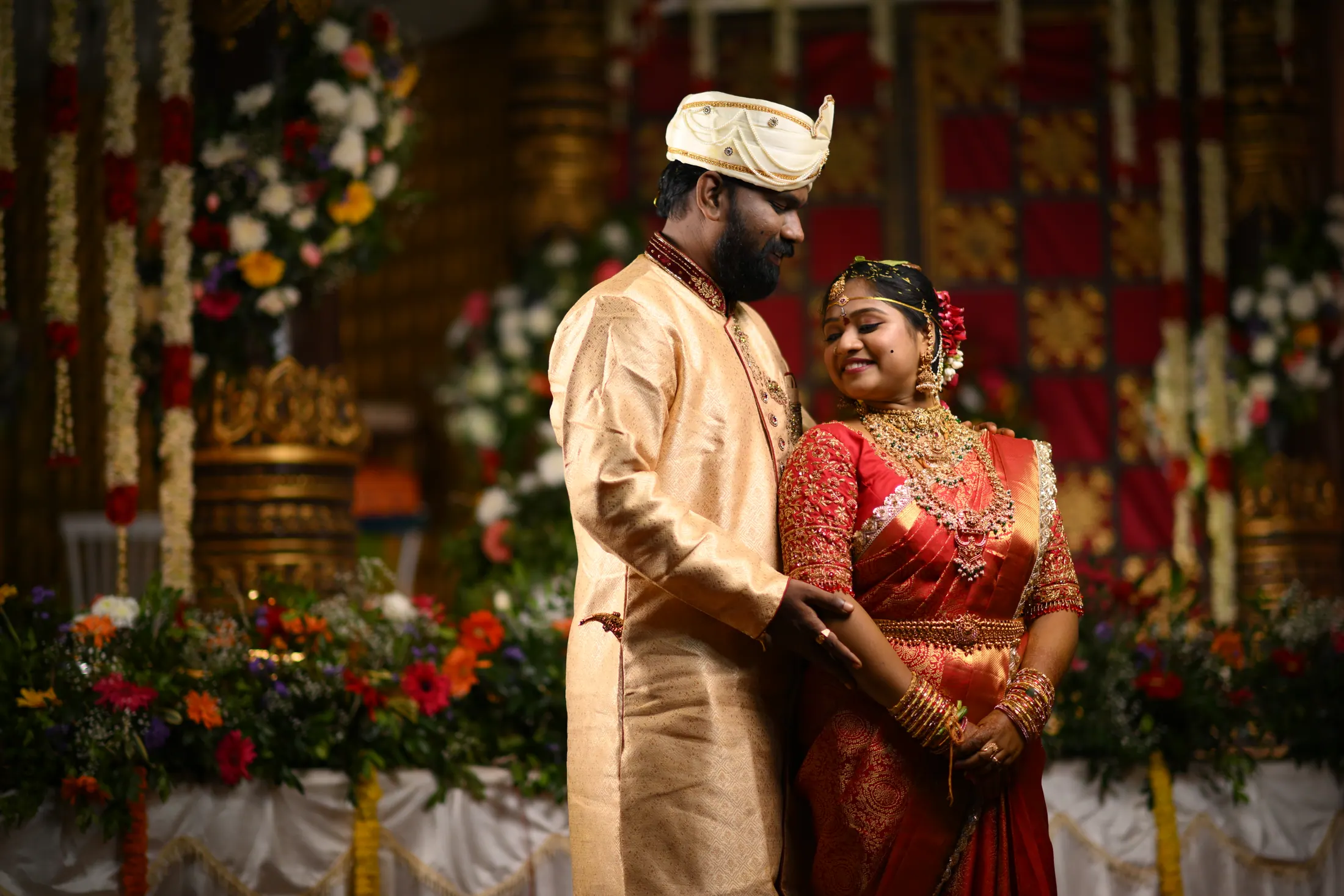 Bride and groom standing together during their wedding celebration