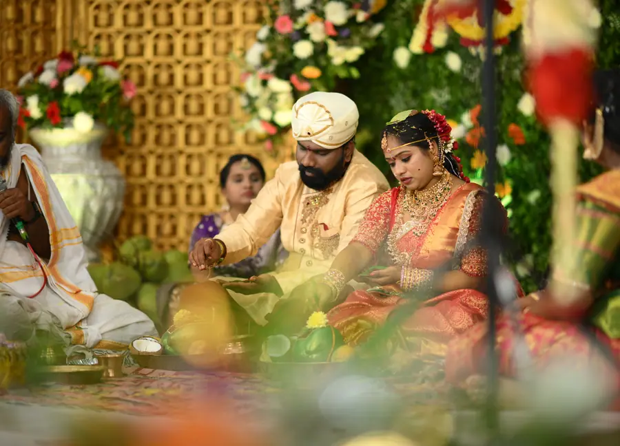 Wedding ritual framed through floral foreground details